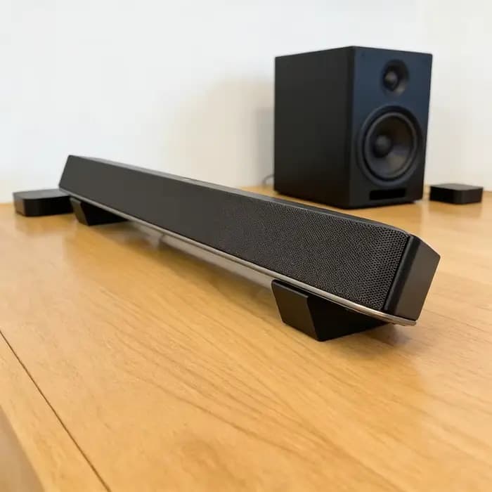 Support universel réglable pour barre de son