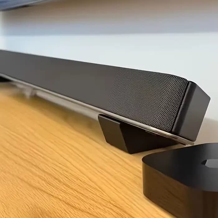 Base universelle pour barre de son