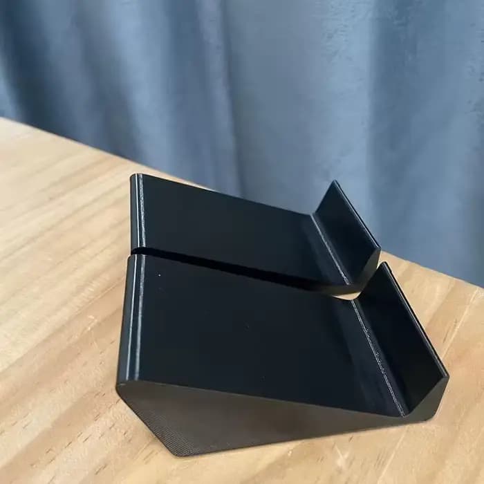 Base universelle pour barre de son