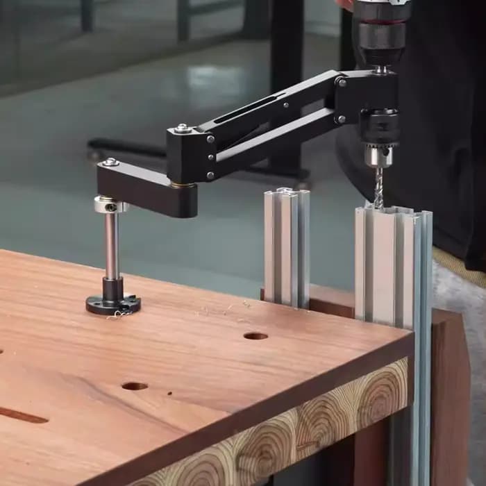 Support de perçage à bras articulé pour perceuse à main